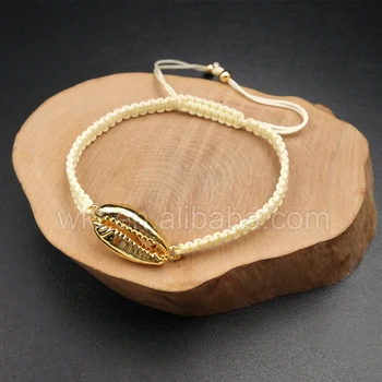 WT-B353 Engros Populære smykker conch shell flettet Armbånd er unikt guld farve Cowrie Armbånd Ocean smykker til surfer gave